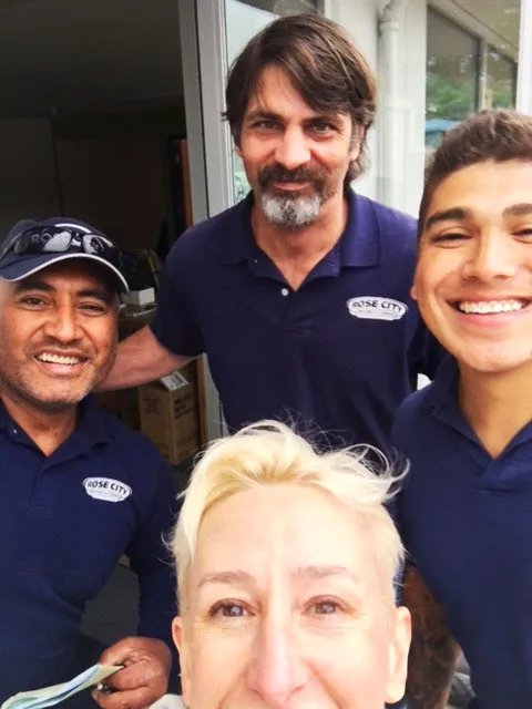 Rose City Moving crew with a happy customer